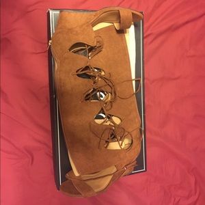 Lace up knee high sandals