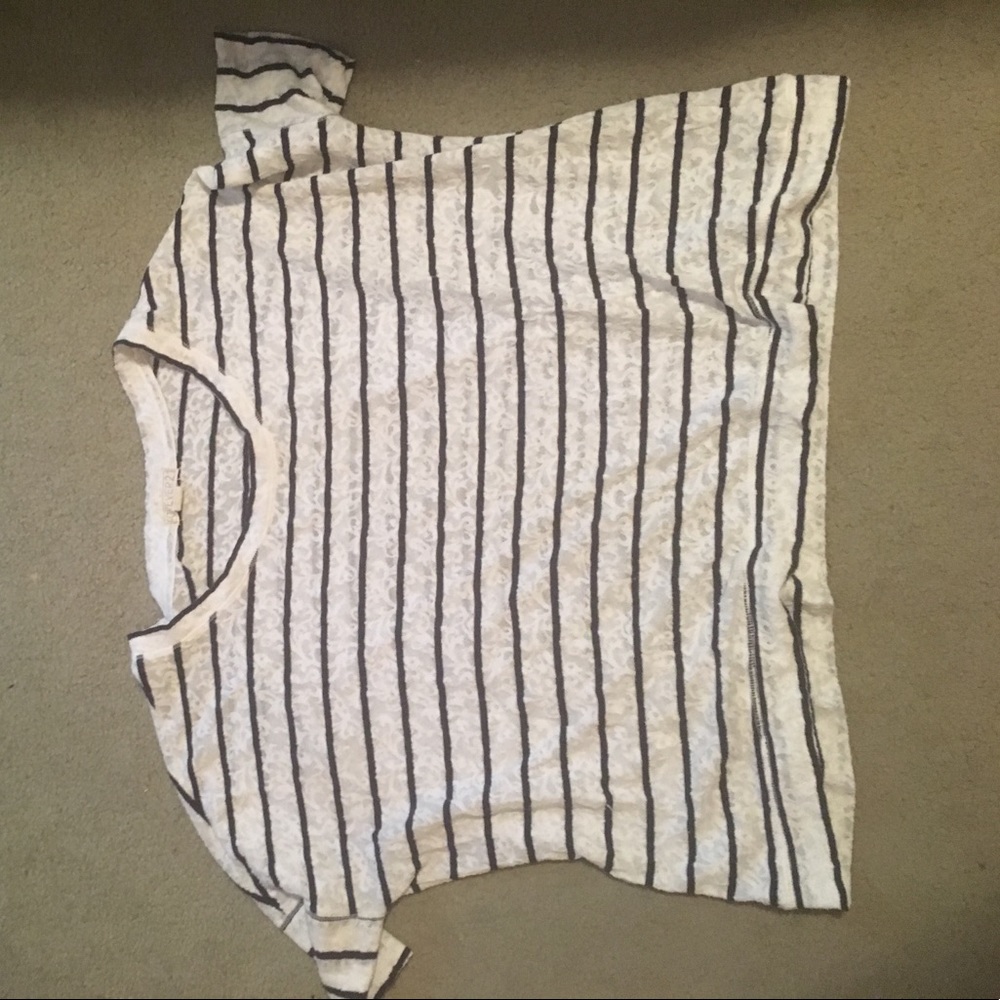 White shirt with blue stripes and design