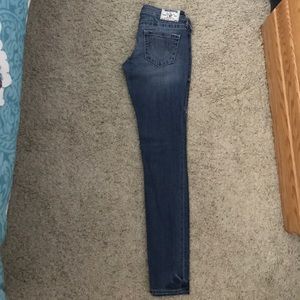 Skinny blue jeans with fade