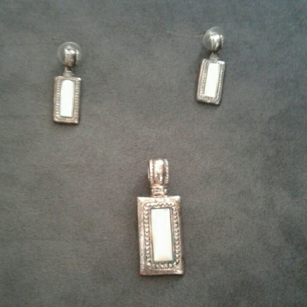 Earrings and matching necklace pendant.