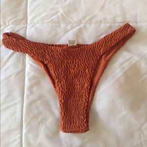Brand new unworn burnt orange bikini bottoms M