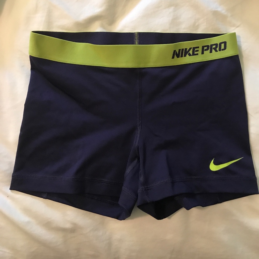 Nike dri-fit purple and green spandex shorts