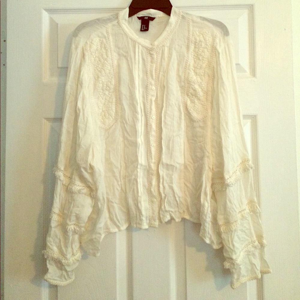 A very chic, stylish embroidered top