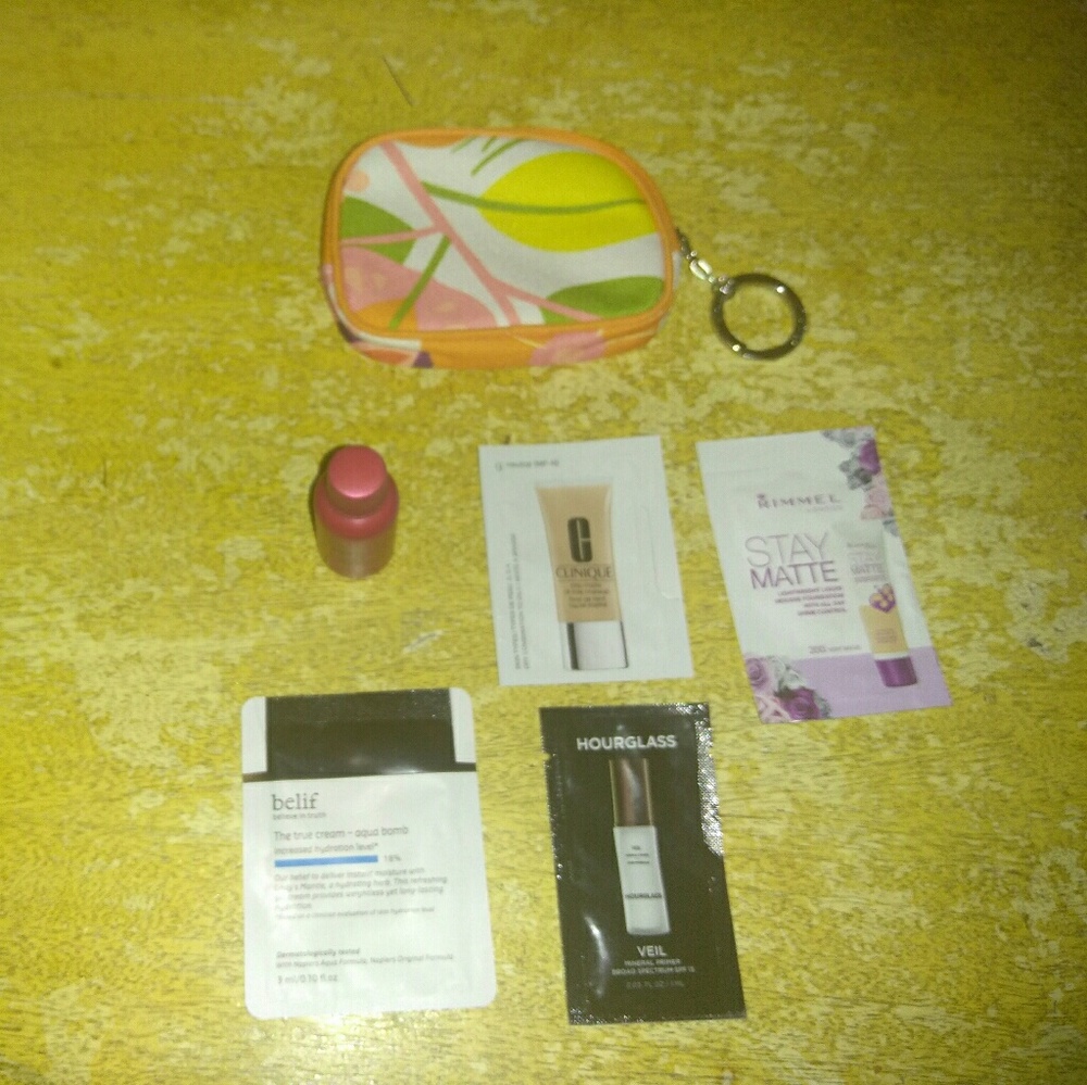 Small BRAND NEW Clinique Makeup bag with samples!