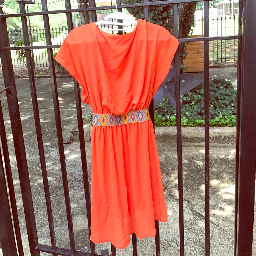 Adorable orange dress with cute waist accent