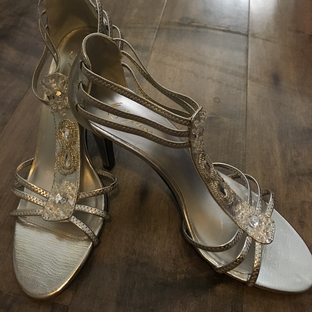 Silver metaphor heels size 8.5 M
