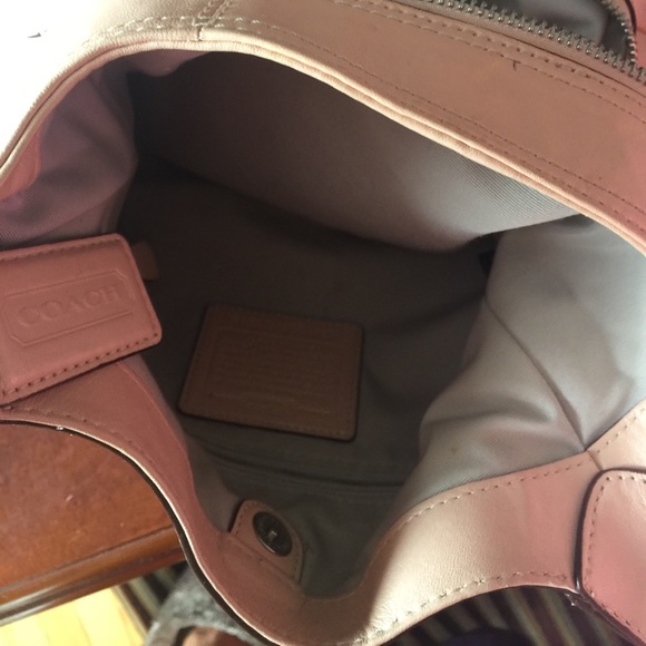 A peach colored purse. - Picture 5 of 5