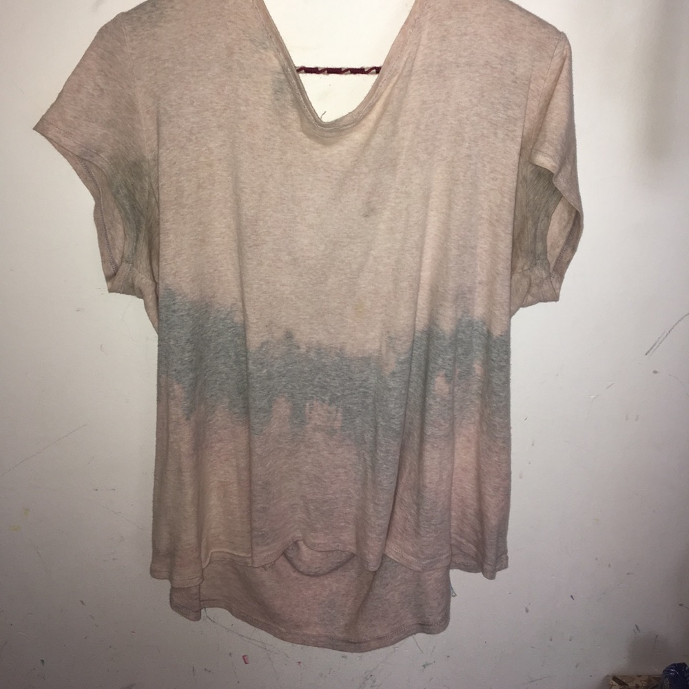 Grey/pinkish shirt.