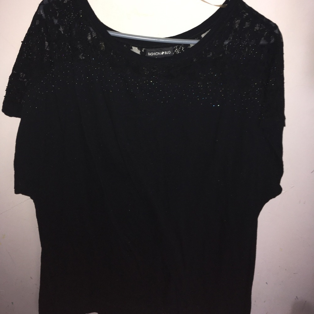 Black shirt.