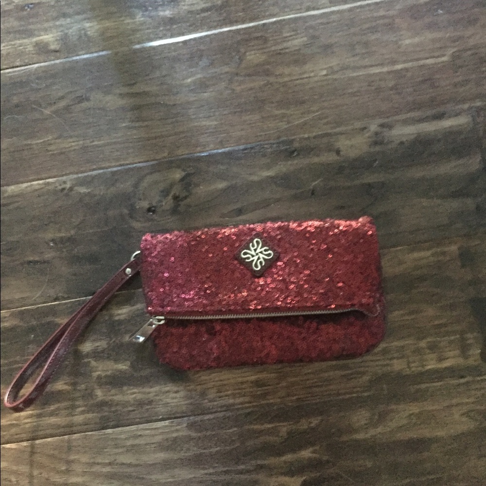 Cranberry colored wristlet with sequins
