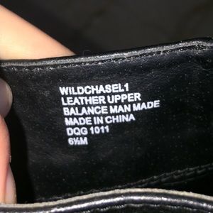 Black leather knee highs