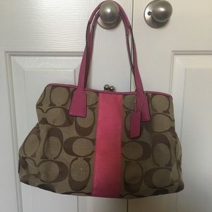 Brown and pink Coach purse