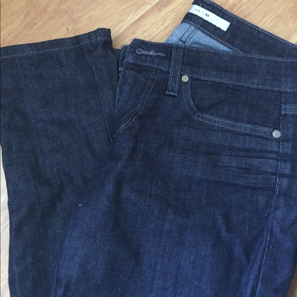 Dark blue jeans w/ some sheen