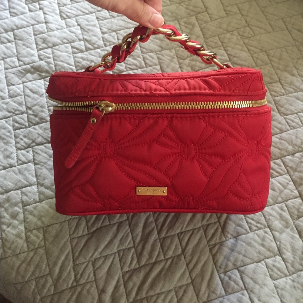 Red Kate Spade makeup bag