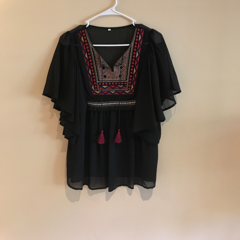 black blouse with colorful embroidery