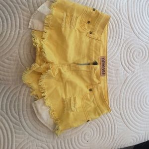 Reverse yellow jean shorts