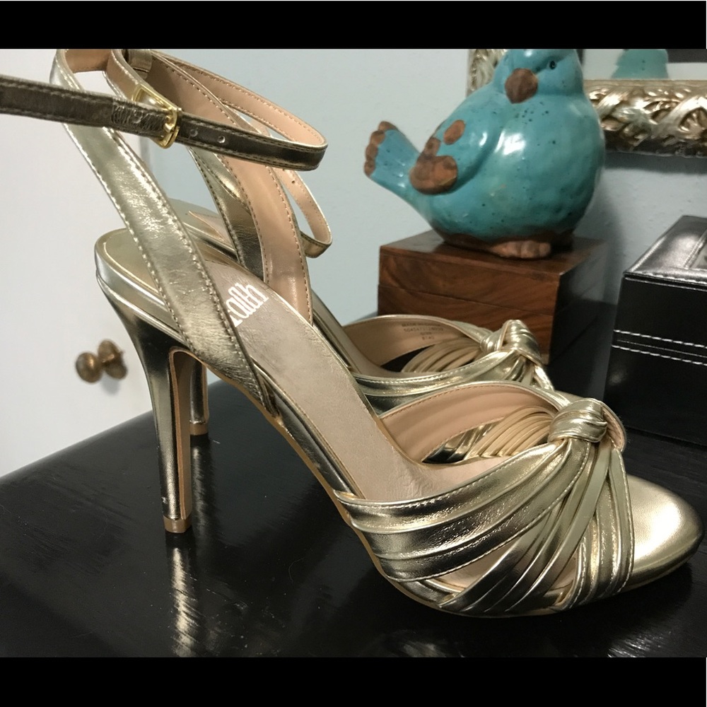 Sexy, strappy, gold heels.
