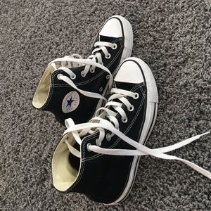 Black high top all star converse
