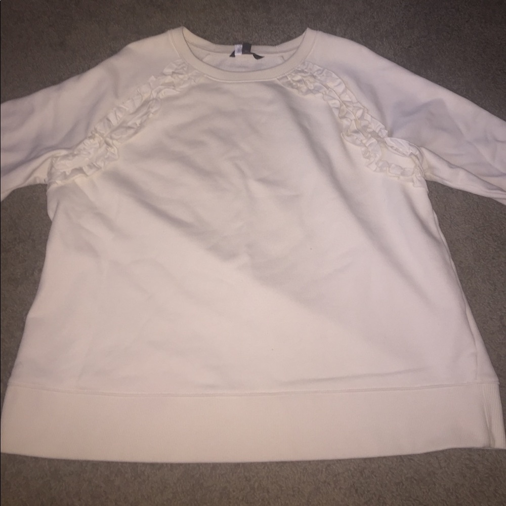 cream ruffled crew neck