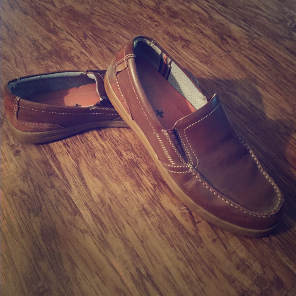 Size 13 slip on brown dress shoes.