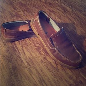 Size 13 slip on brown dress shoes.