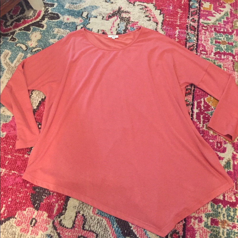Umgee coral tunic with asymmetrical hem