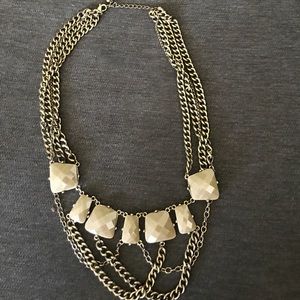 Taupe and gold statement necklace.