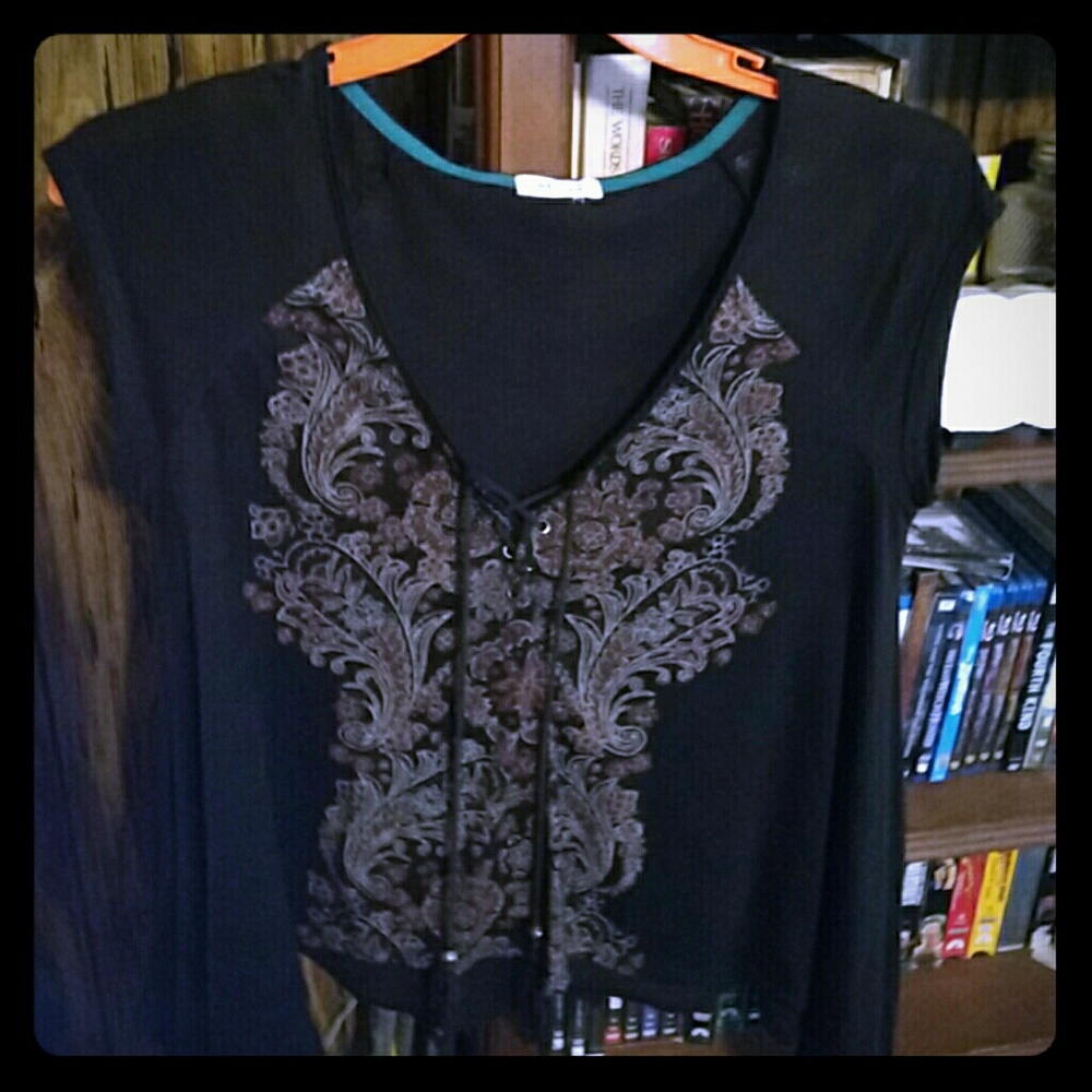 Brown shirt with floral/fancy print