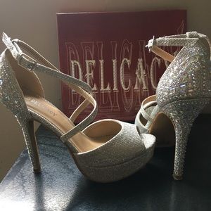 Silver sparkly heeled heels.