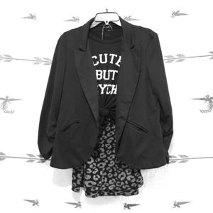 Black one button high/low blazer.