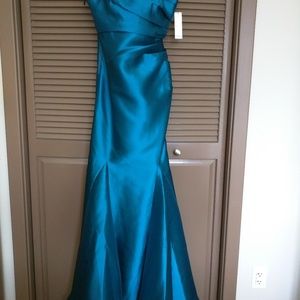Peacock -blue full length gown with short train