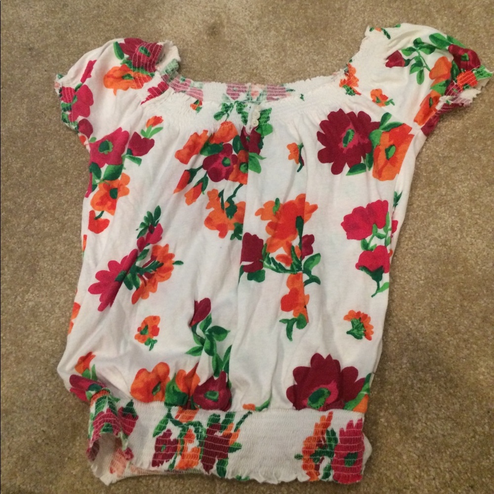A white floral tank top