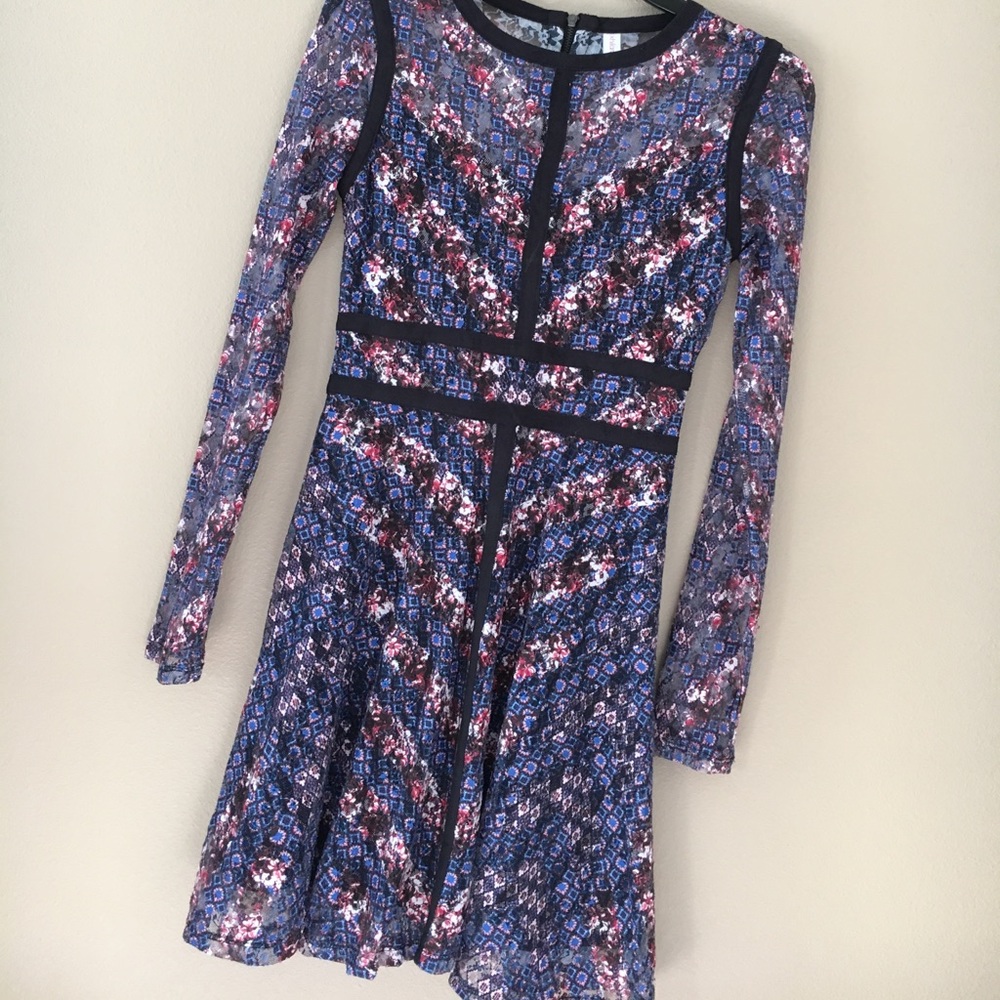 A long sleeved mini dress