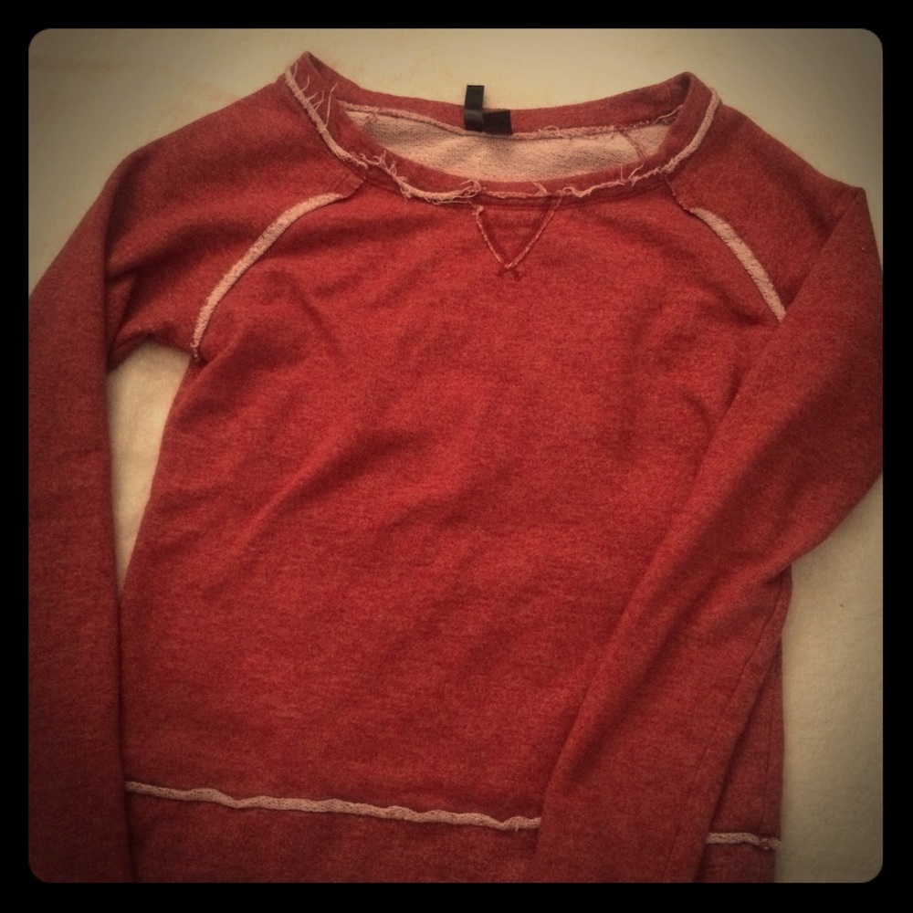 Red frayed sweater