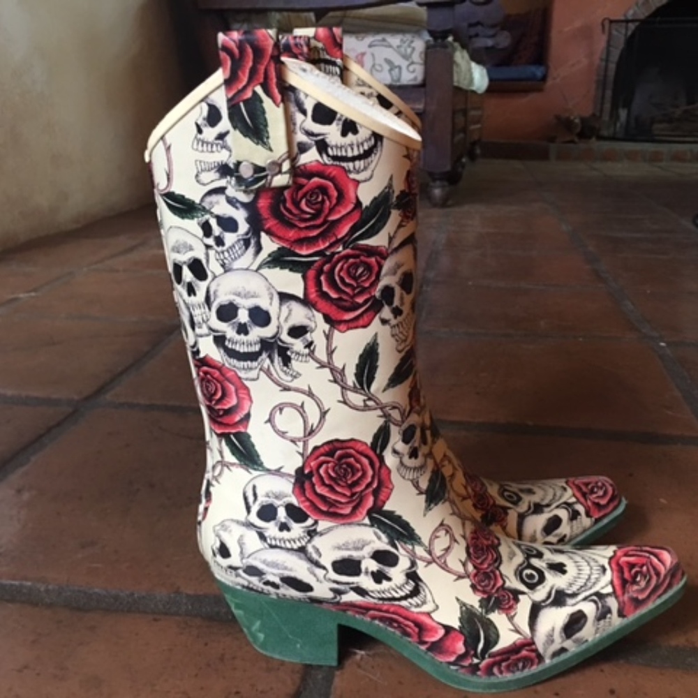Rubber cowgirl boots, skulls and roses.