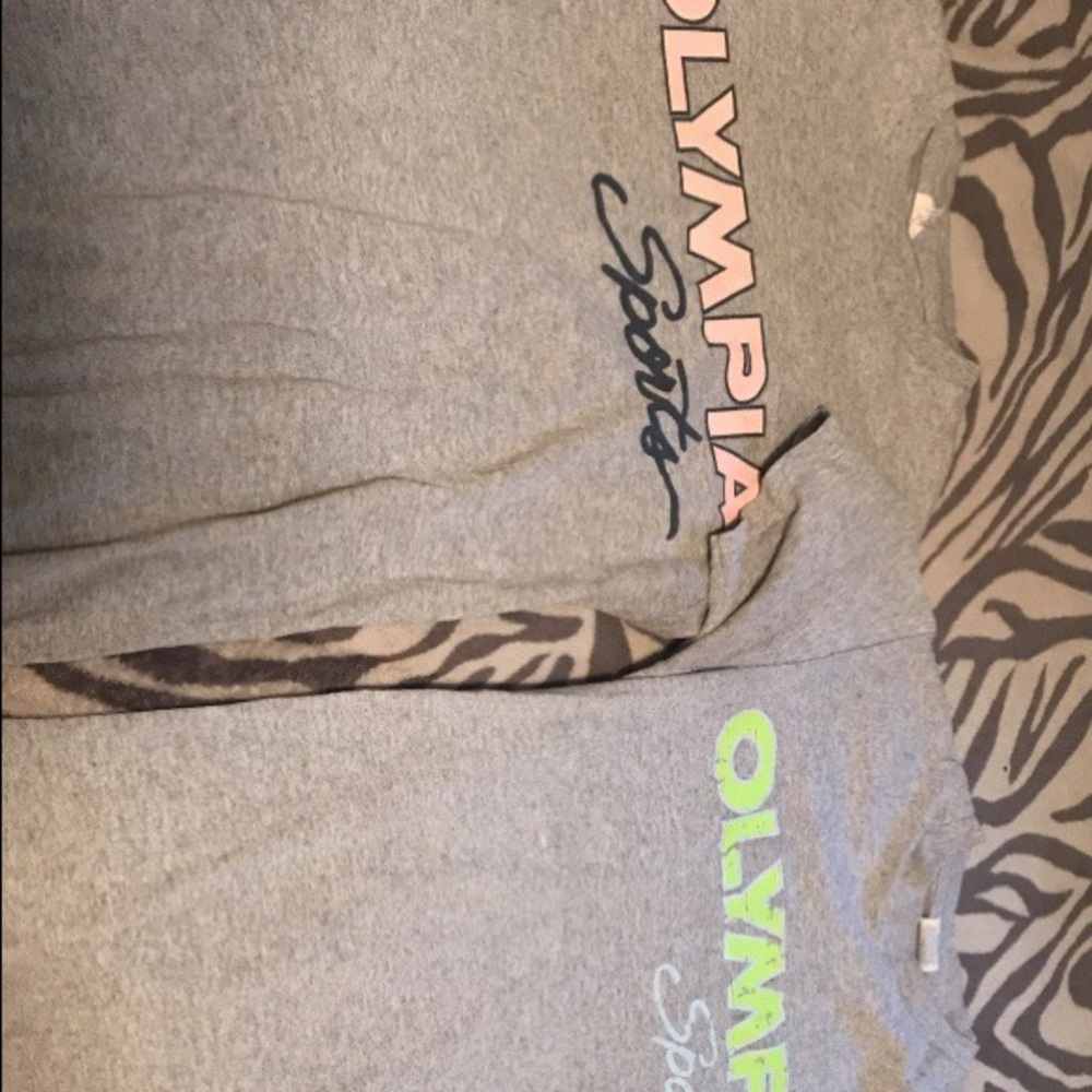 2 Olympia sports workout shirts.