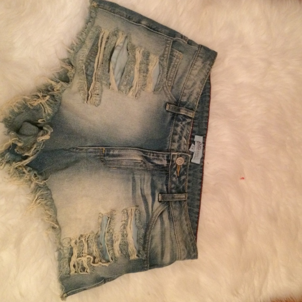 Blue denim faded wash fringe vintage style shorts