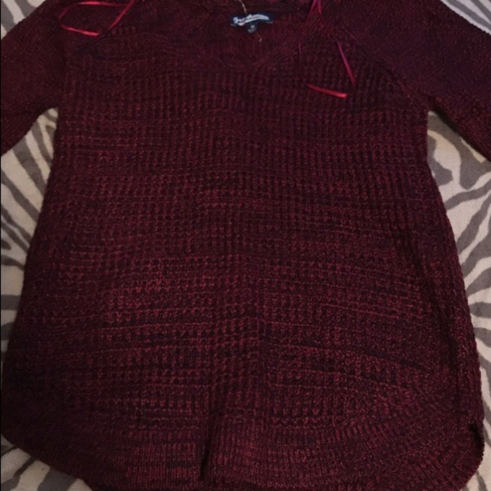 Knitted sweaters.