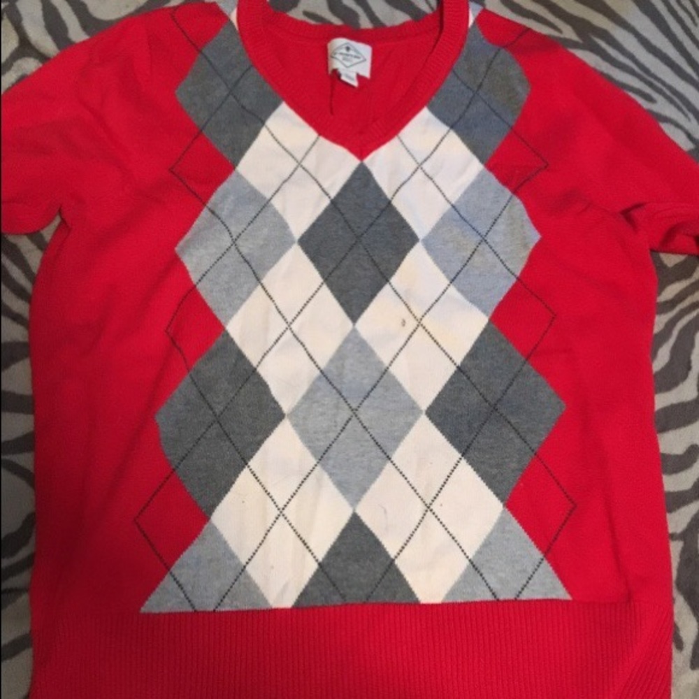 Red plaid sweater.