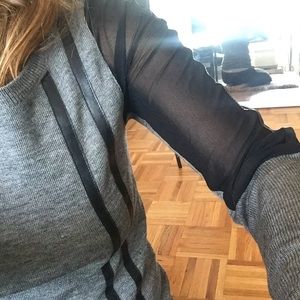 Grey sweater with sheer sleeves