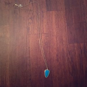 Blue Triangle Necklace With Gold Accent.