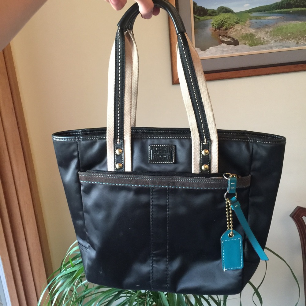 Adorable Coach tote with teal tag