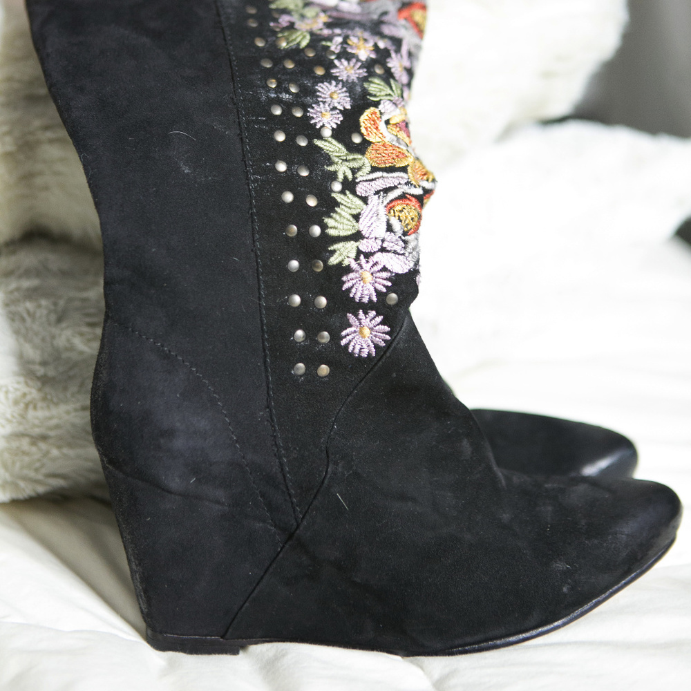 Black Free People boot w/ enbroidered detail.  37.