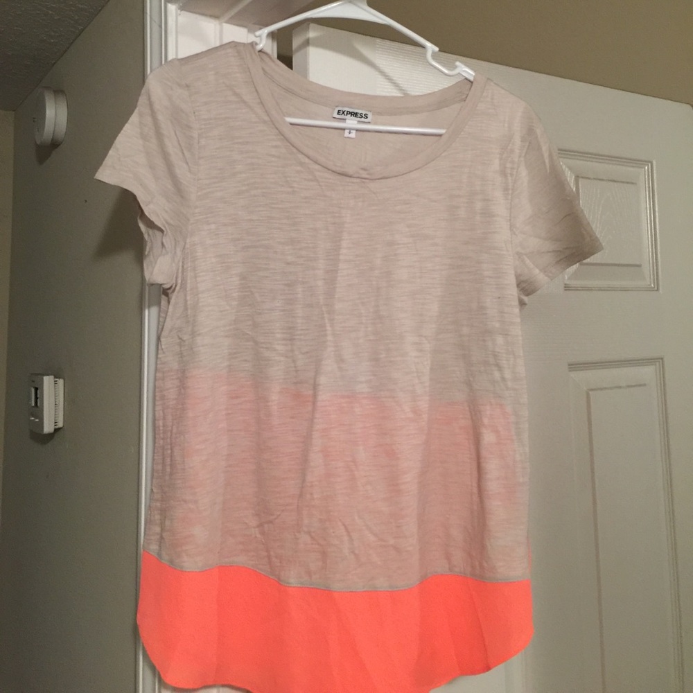 Express creme and pinkish/orange top