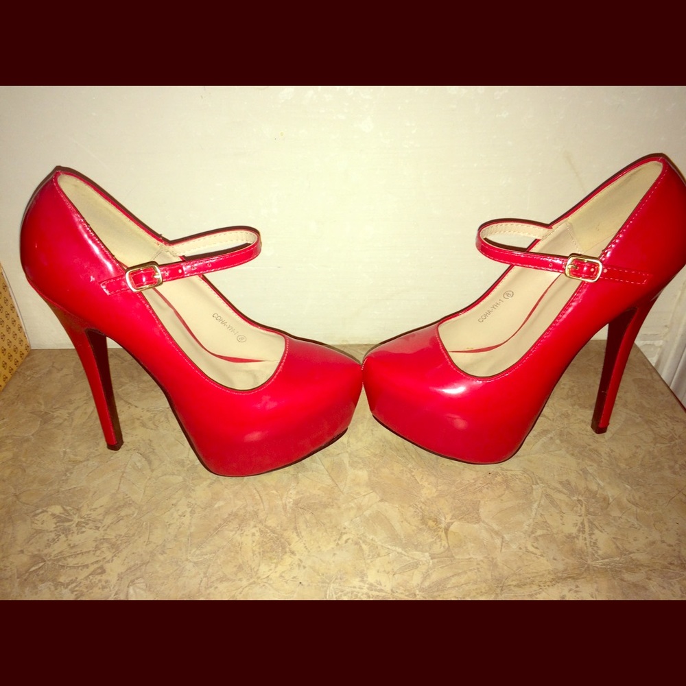 Red Mary Jane platform pumps