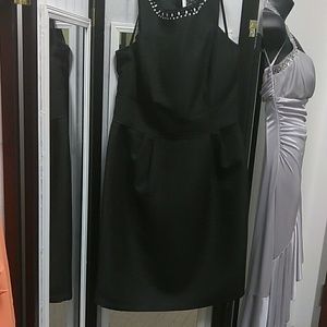 Black dress with beads around the neck line