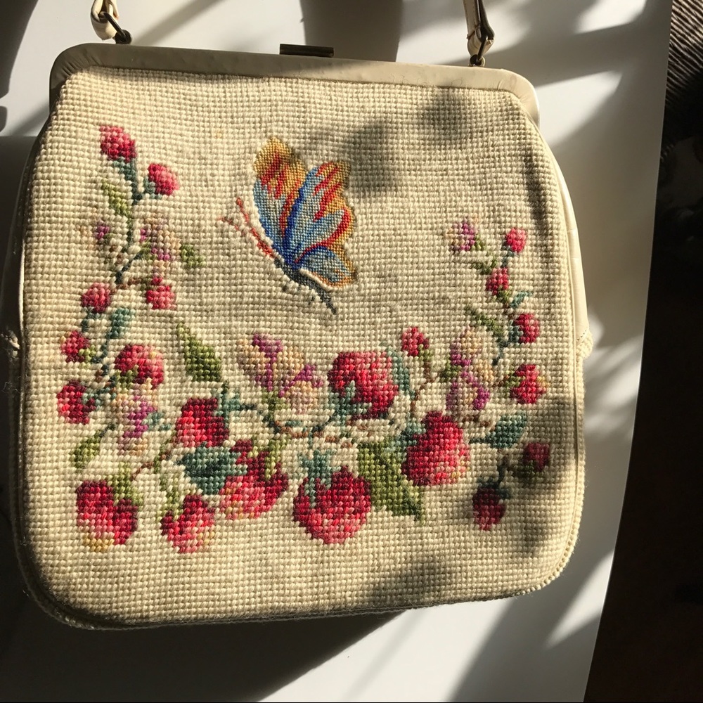 Vintage tapestry and leather pocketbook.