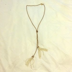 Gold necklace with pearl tassels