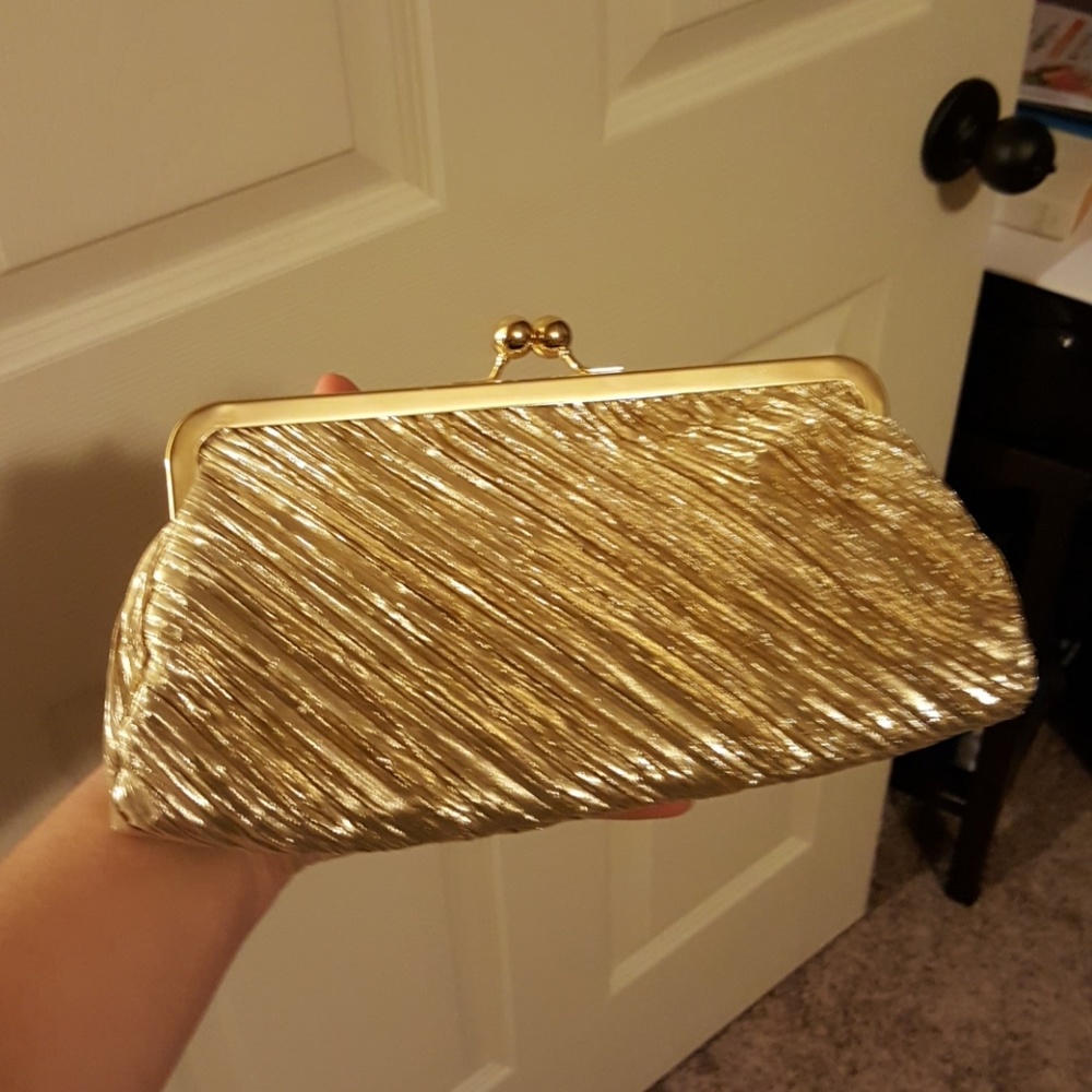 Gold colored clutch purse
