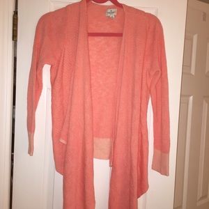 American eagle coral colored sweater.